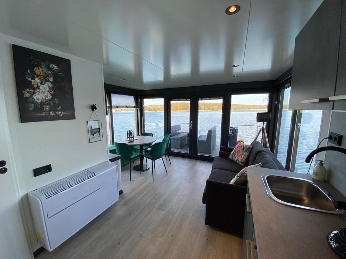 Houseboat met dakterras Mookerplas Middelaar Buitenkant foto